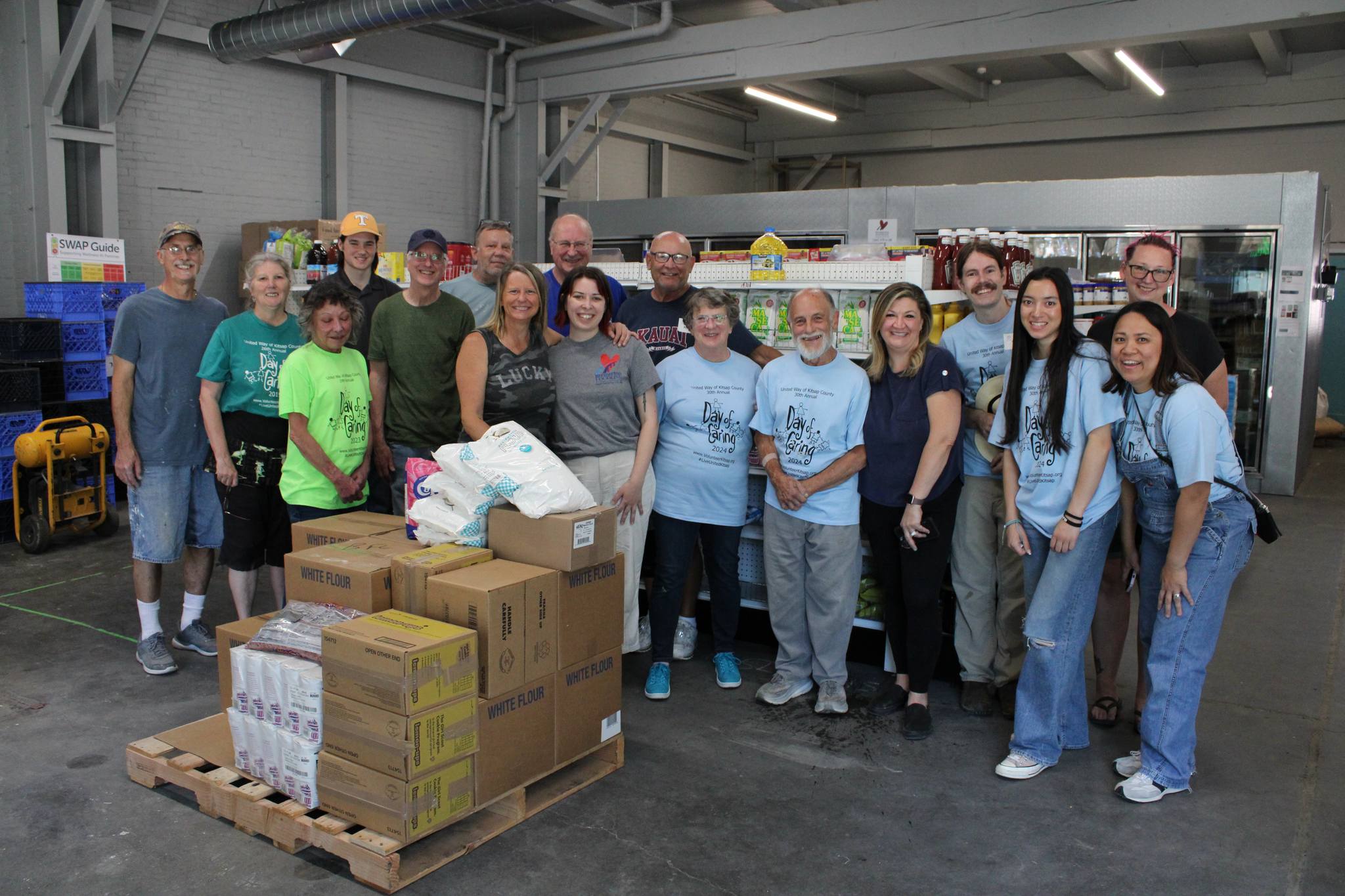 Group of volunteers posing in Bremerton Foodline warehouse