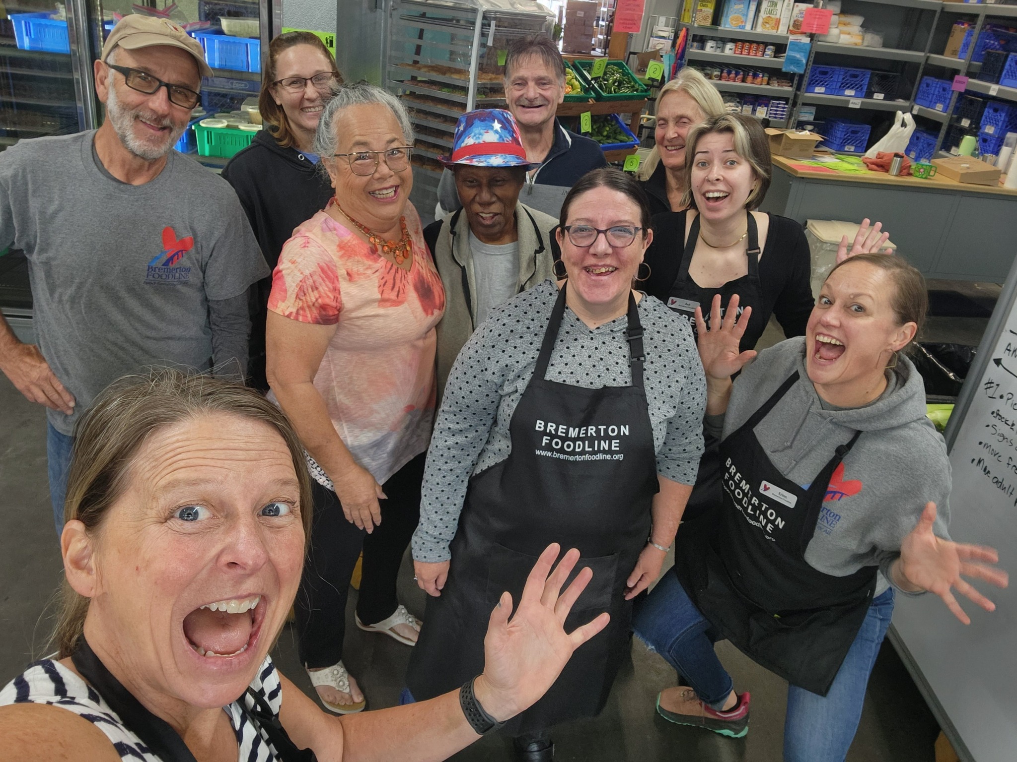 Bremerton Foodline team members smiling in the food bank